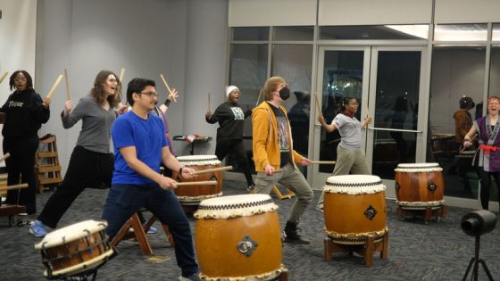 UMSL students play taiko drums