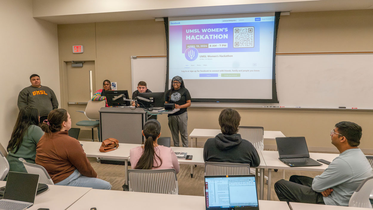 UMSL students meet last Thursday evening in Anheuser-Busch Hall to discuss marketing, logistics, speakers and other aspects of the 2024 Women’s Hackathon