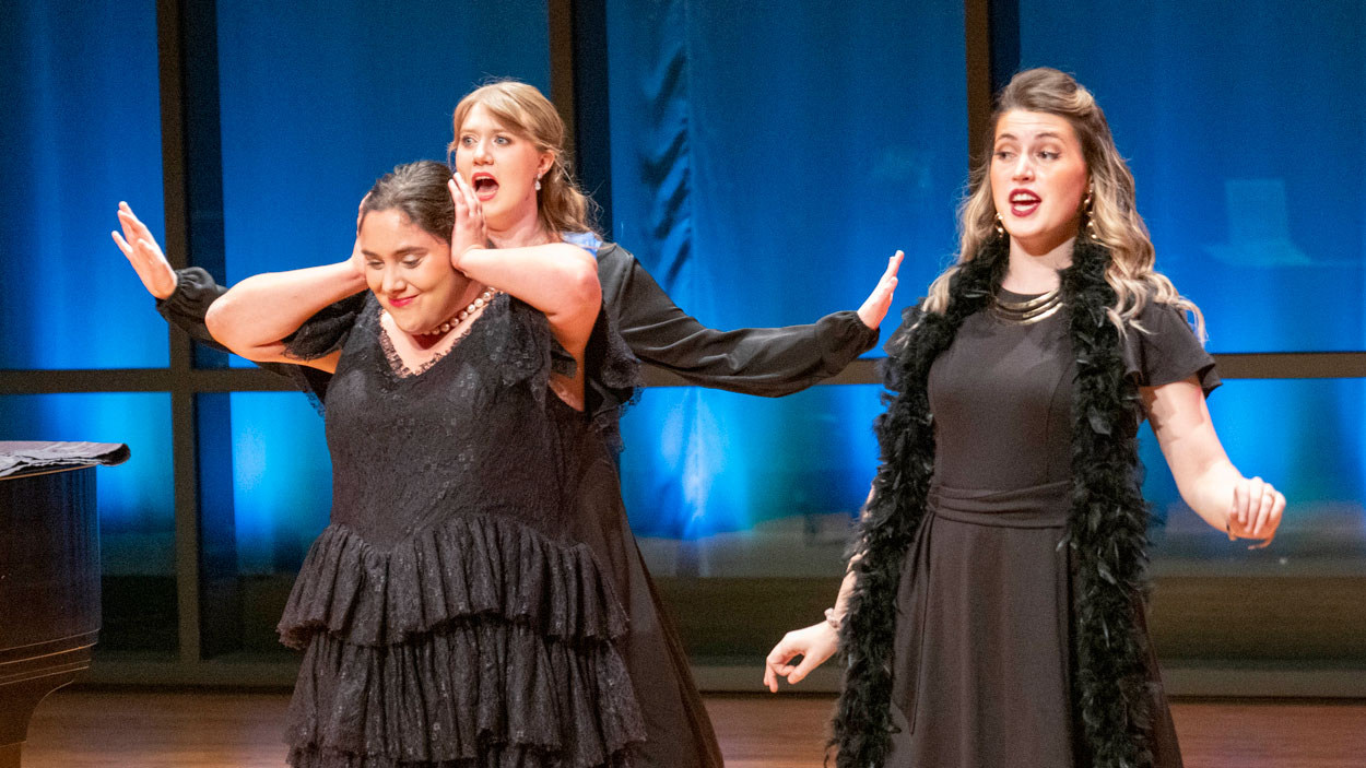Rachel Anthonis, Rita Schien, and Vanessa Tessereau rehearse for the UMSL Opera Workshop's production of "The Impresario"