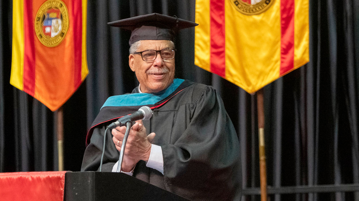 UMSL alum Joseph Yancey delivers the commencement address to graduates of the College of Arts and Sciences and the College of Nursing on Saturday morning.