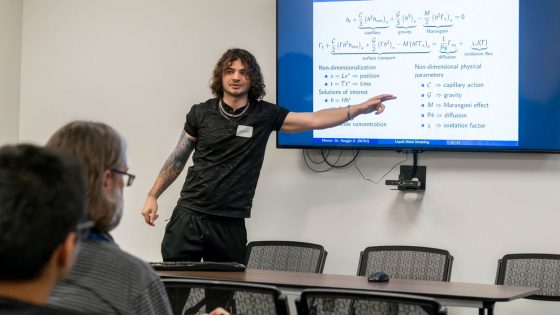 Luis Schneegans presents some of his research on "He had multiple chances to present last summer’s work on “Mathematical Modeling of EGaIn Droplets Sliding Down an Inclined Plane,” during UMSL’s Undergraduate Research Symposium in late April.