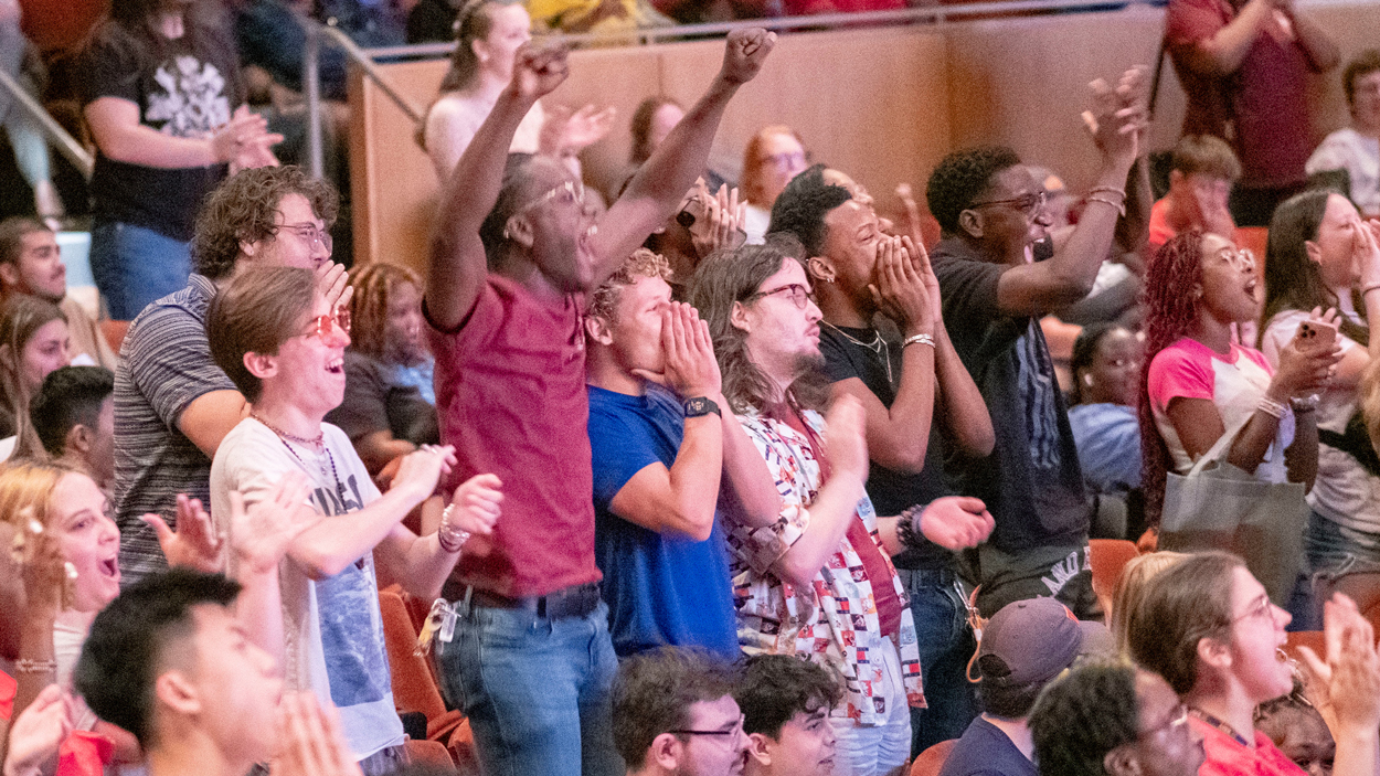 Students cheer during convocation