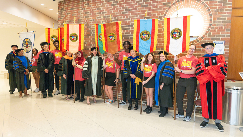 Chancellor, provost, deans and flag bearers