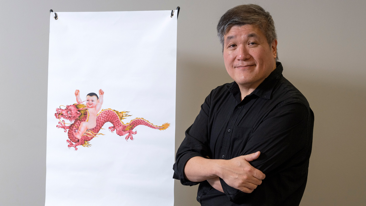 Minsoo Kang with depiction of the "Naked Sky Baby" from his novel