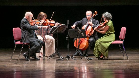 The Arianna String Quartet performs on stage at the Blanche M. Touhill Performing Arts Center