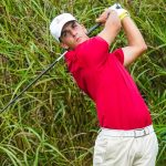 Men's golfer Dani Solavera follows through on his swing