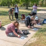 UMSL astronomy students observe the path of the sun last week outside University Libraries on North Campus during a class led by Mohi Saki