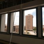 A view from inside future staff offices on the fifth floor of the Thomas Jefferson Library looking out onto the Quad and the Tower