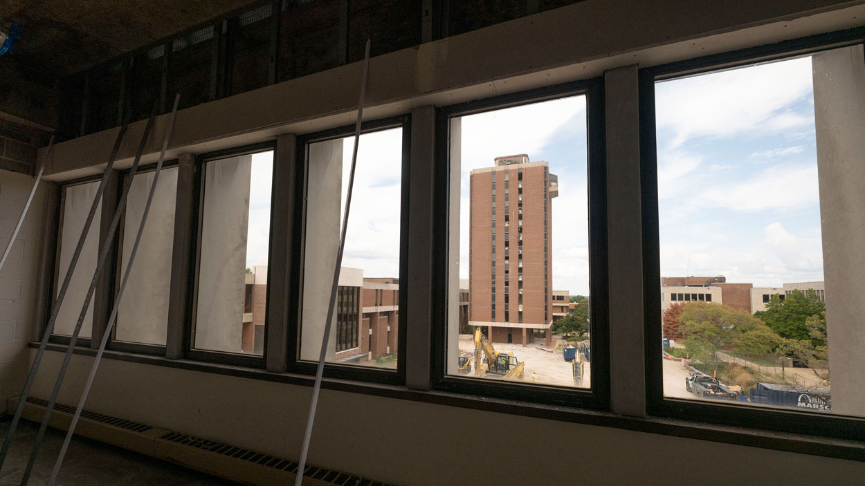 A view from inside future staff offices on the fifth floor of the Thomas Jefferson Library looking out onto the Quad and the Tower