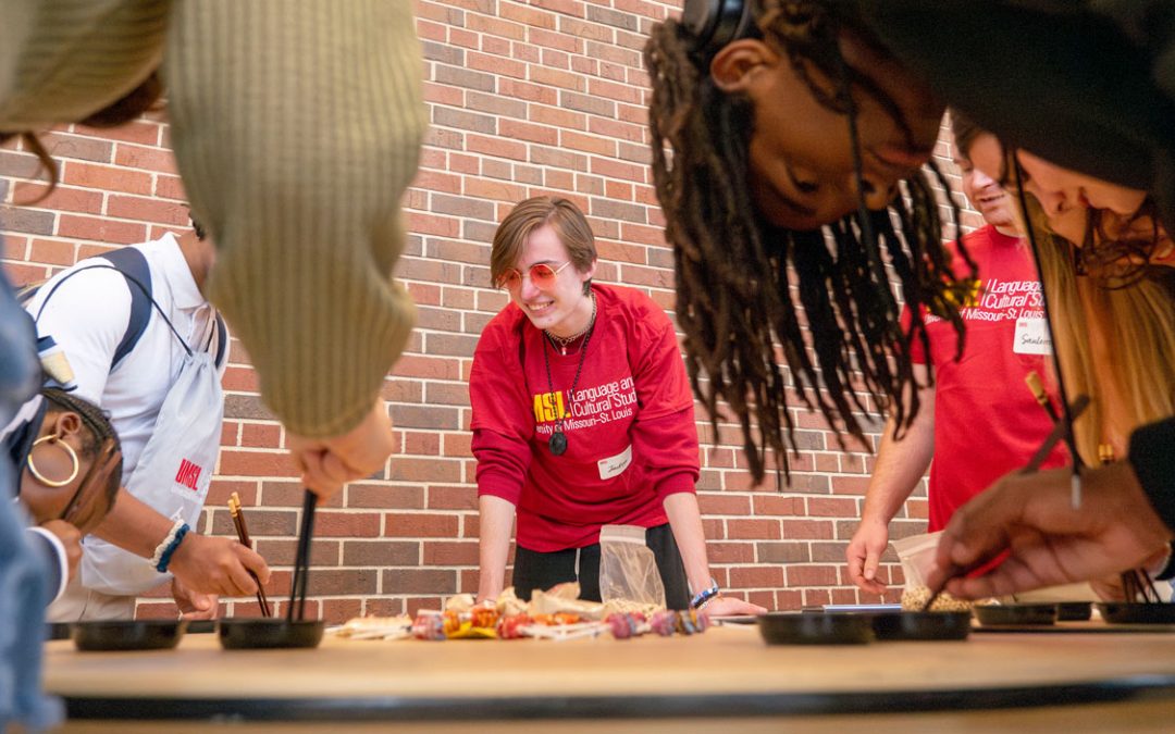 UMSL language students give back at World Languages Day celebration after participating as high schoolers