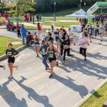 Runners set off at the start of the UMSL Alumni 5K Run/Walk on Saturday morning