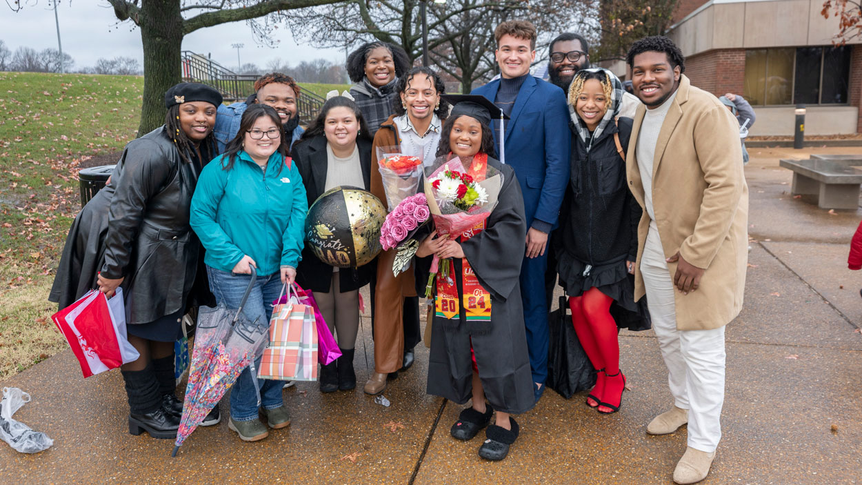 Biochemistry and biotechnology graduate Jay King takes photos with friends on Saturday afternoon.