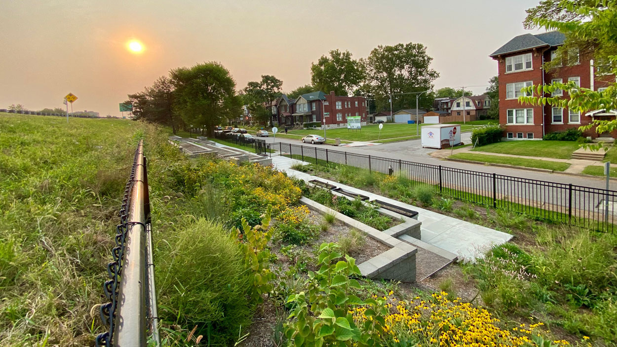 The sun sets over The Green House Venture's Embankment Greenway along Interstate 44 in St. Louis.