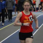 Bridget Ragan leads a pack of runners in the Principia Relays