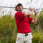 UMSL golfer Leo Baudry watches after hitting a drive