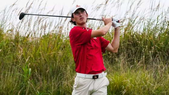 UMSL golfer Leo Baudry watches after hitting a drive