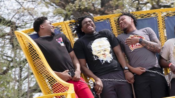 Troy Glover, Emanuel Prospere, and Iziah Purvey ride G Force during the Mirthweek Carnival.