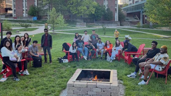 Members of the UMSL Community take part in the UPB Ignite the Night bonfire