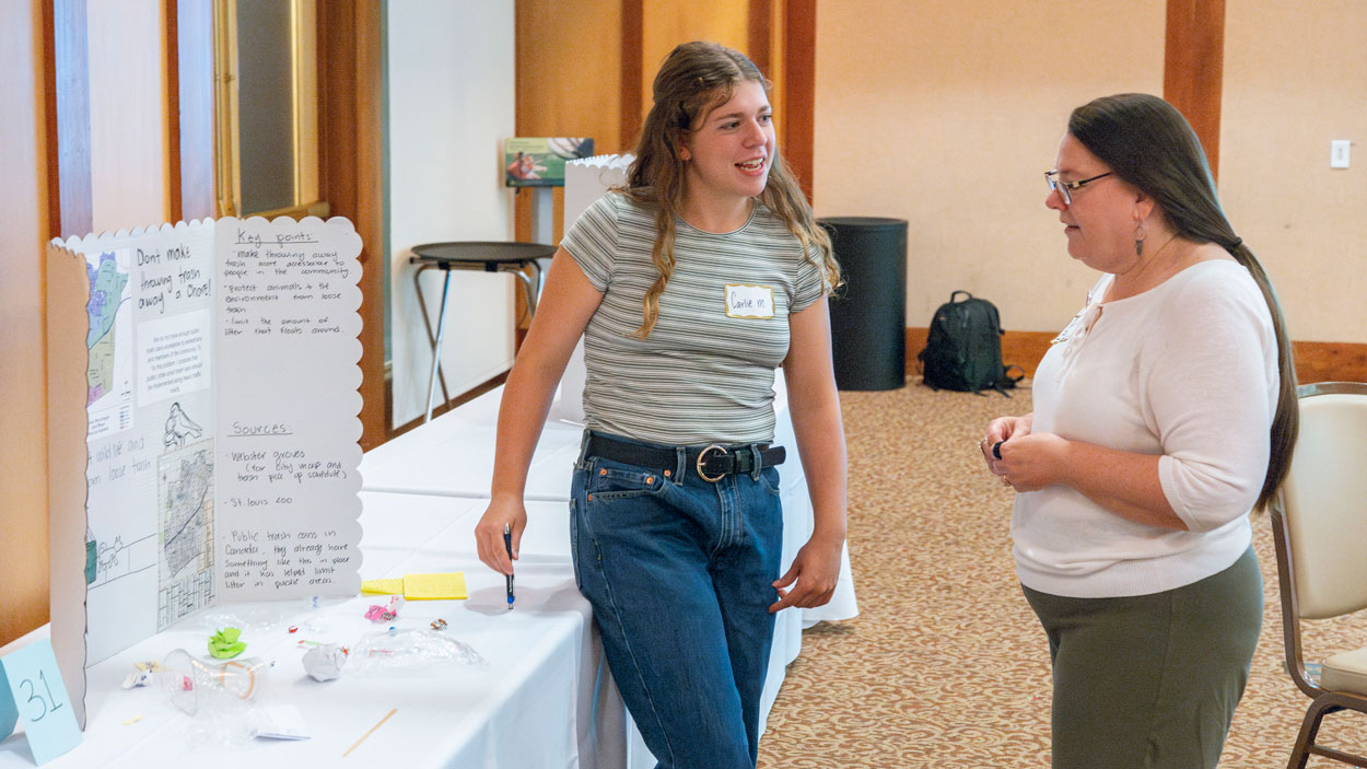 Student at MyImpact Challenge Showcase explains project