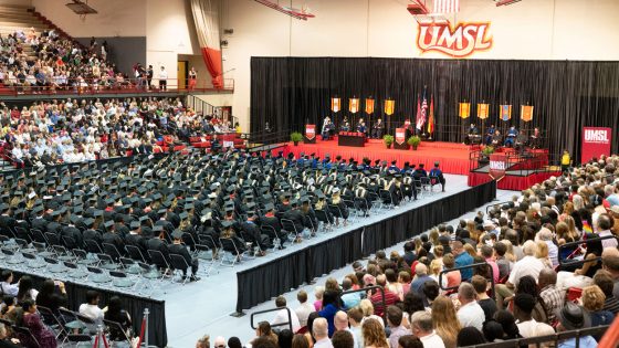 Friends and family members fill the stands at the Mark Twain Athletic Center during Friday evening's ceremony for the College of Business Administration and UMSL/Washington University Joint Undergraduate Engineering Program
