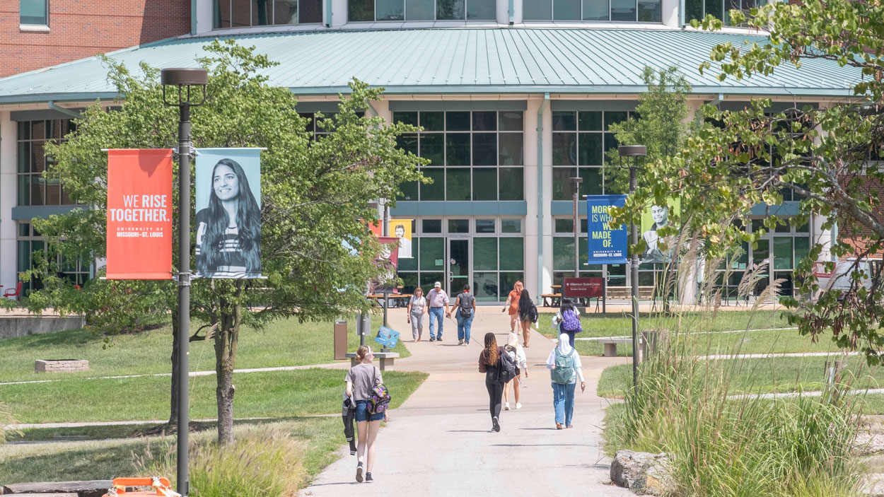 Students walking between classes toward the Millennium Student Center