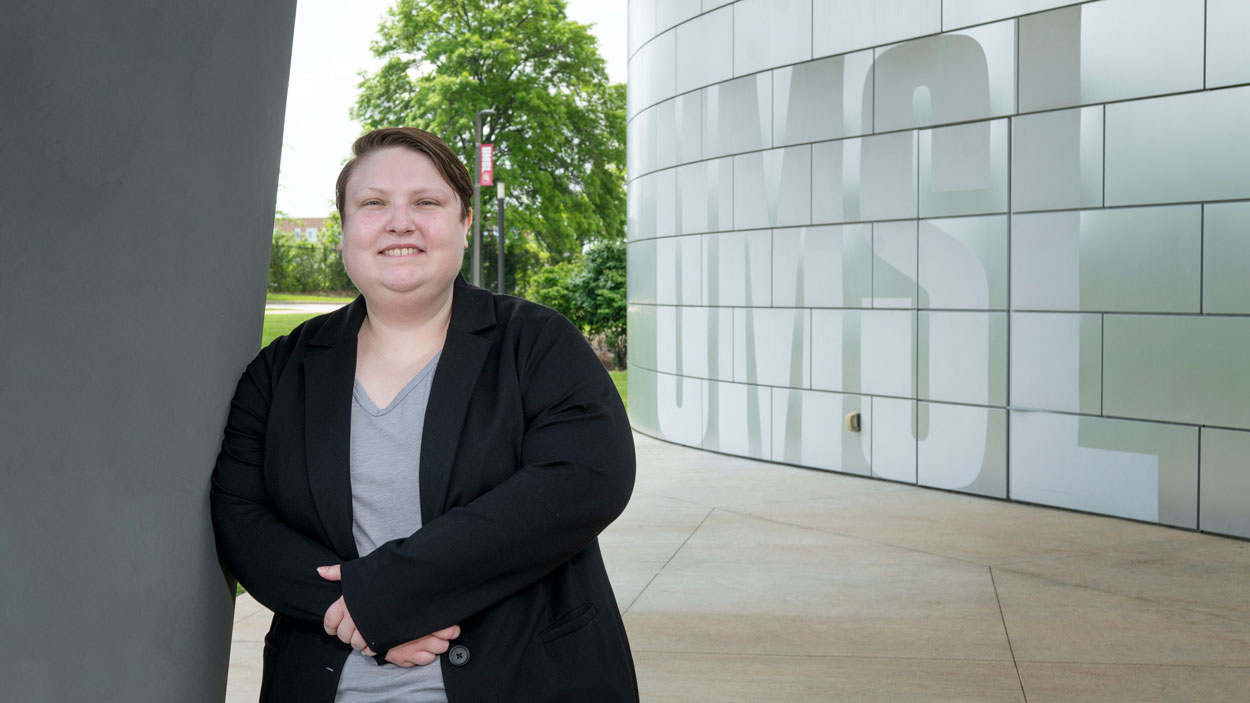 Kel Gruber stands outside the Recreation and Wellness Center