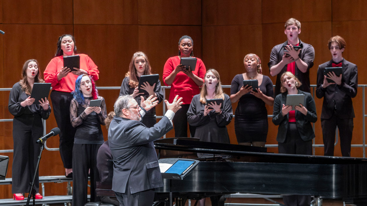 Jim Henry directs University Singers and Vocal Point