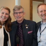 Professor James O'Brien (center) stands with American Chemical Society St. Louis Section Chair Elizabeth Bergman and Mikhail Berezin, ACS St. Louis Section Awards Committee Chair
