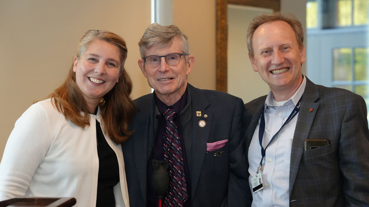 Professor James O'Brien (center) stands with American Chemical Society St. Louis Section Chair Elizabeth Bergman and Mikhail Berezin, ACS St. Louis Section Awards Committee Chair