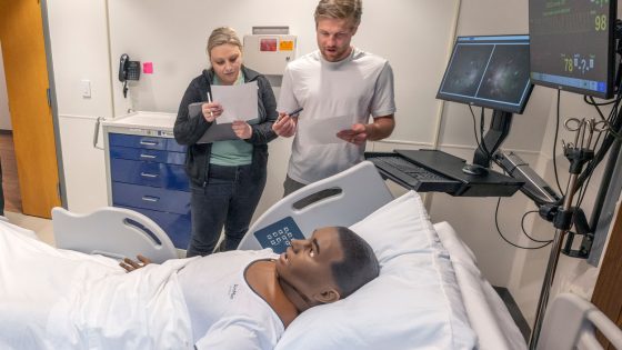 Optometry students work through hypertension simulation in the Nursing Simulation Lab