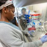 Hazelwood Central graduate and CLIMB intern Jolaade Bada runs an experiment while working in the lab of Professor Wendy Olivas