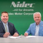 Ryan Murphy, president of Nidec Americas Holding Corporation, and UMSL Provost Steven J. Berberich sign a memorandum of understanding to formalize the partnership between the company and the university