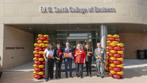 (From left) Alexandria “Alex” Paubel, president of the Dean's Student Advisory Board, Ed G. Smith College of Business Dean Shu Schiller; Ed G. Smith, UMSL alum and founder of American Direct Marketing Resources; UMSL Chancellor Kristin Sobolik; Lyda Krewson, University of Missouri Board of Curators; and UMSL Provost and Vice Chancellor for Academic Affairs Steven J. Berberich at the dedication of the Ed G. Smith College of Business