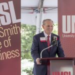 Ed G. Smith speaks during a dedication ceremony for the Ed G. Smith College of Business at the University of Missouri–St. Louis.