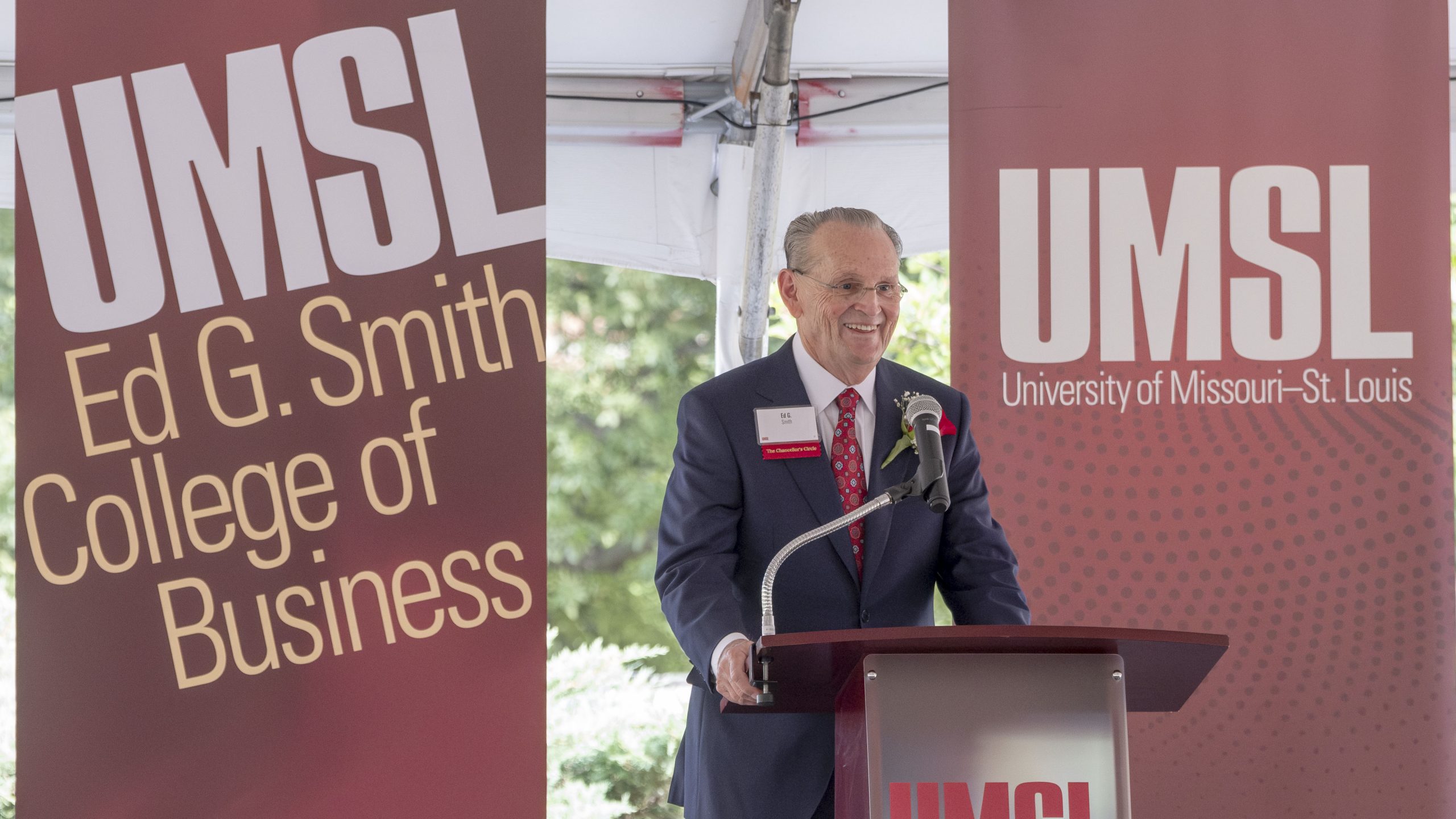 Ed G. Smith speaks during a dedication ceremony for the Ed G. Smith College of Business at the University of Missouri–St. Louis.