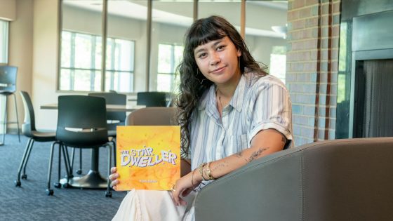 UMSL alum Nicole DuFour with her book, The Star Dweller