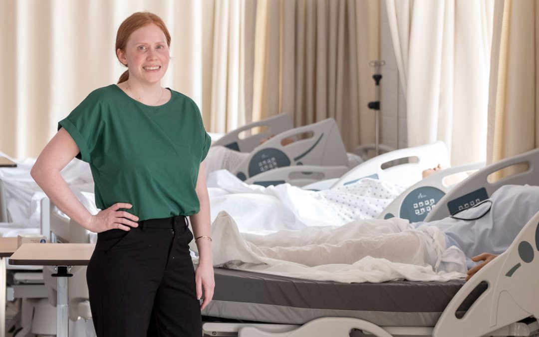 DNP graduate Victoria Cobb works with BSN students to treat loneliness in older adults