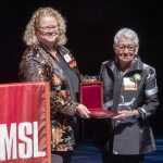 Chancellor Kristin Sobolik presents Barbara Kohm with the E. Desmond and Mary Ann Lee Medal for Philanthropy during the 34th annual Founders Celebration