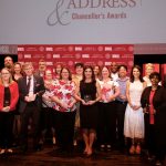 2025 Chancellor's Awards recipients pose on stage