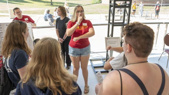 Criminology and criminal justice major University of Missouri–St. Louis criminal justice and criminology major Emma Gudgel teaches simple phrases and answers questions using American Sign Language as part of World Languages Day at the Blanche M. Touhill Performing Arts Center.