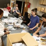 Members of UMSL’s Addiction Science Team assemble overdose prevention kits with doses of naloxone and information about treatment for addiction as part of their efforts to combat the opioid crisis in Missouri and reduce overdose deaths.