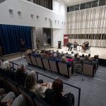 Guests listen in the seats of the Arianna String Quartet Recital Hall as the group performs during Tuesday's opening.