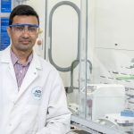 Chemistry alum Saroj Kafle in API Innovation Center's Research and Development Lab