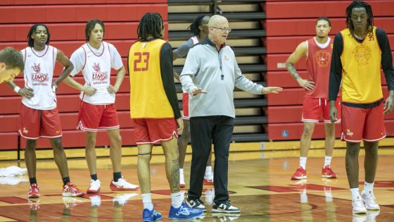Bob Sundvold talks to his players during a preseason workout at the Mark Twain Athletic Center