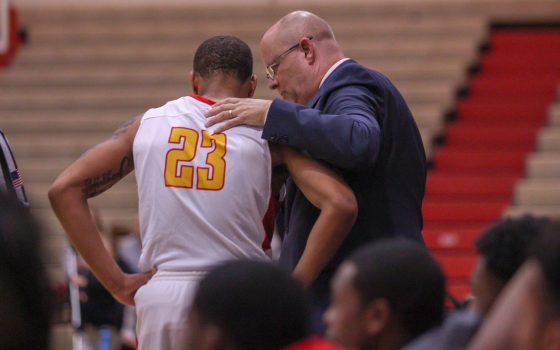 Bob Sundvold offers guidance to Steve Webb during a stoppage in play
