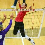 Addison Voorhees jumps to attack the ball in Friday's match against McKendree