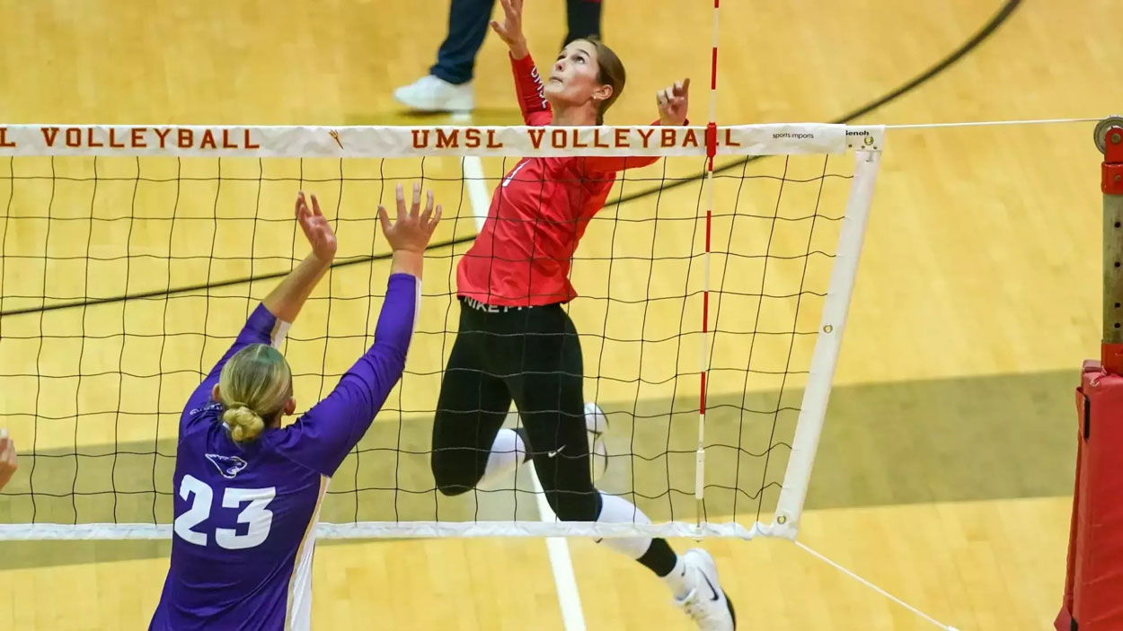 Addison Voorhees jumps to attack the ball in Friday's match against McKendree