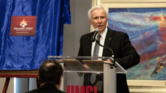 Michael Cosmopoulos addresses the audience at a celebration to commemorate the creation of "Kyklos – Circle of Glory"