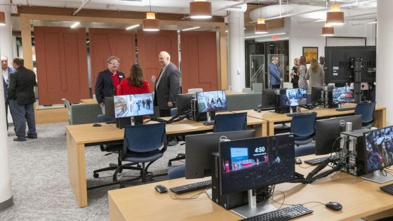 Attendees of Wednesday's reception converse with each other in Thomas Jefferson Library's new computer lab.