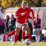 Maddie Clark dribbles a soccer ball in a recent match